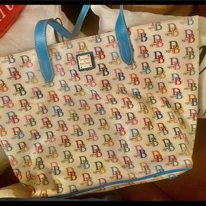 Dooney & Bourke Multi colored handbag & wristlet